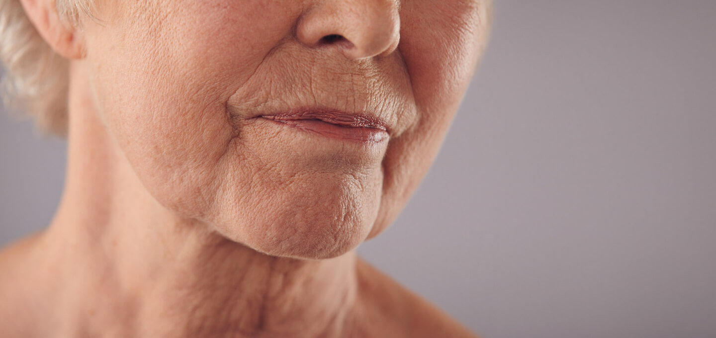 A close up of an older woman's face.