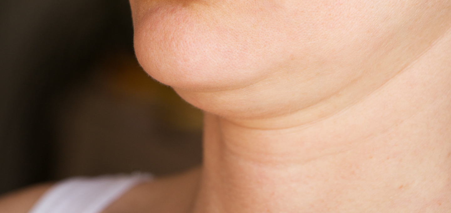 A close up of a woman's neck.