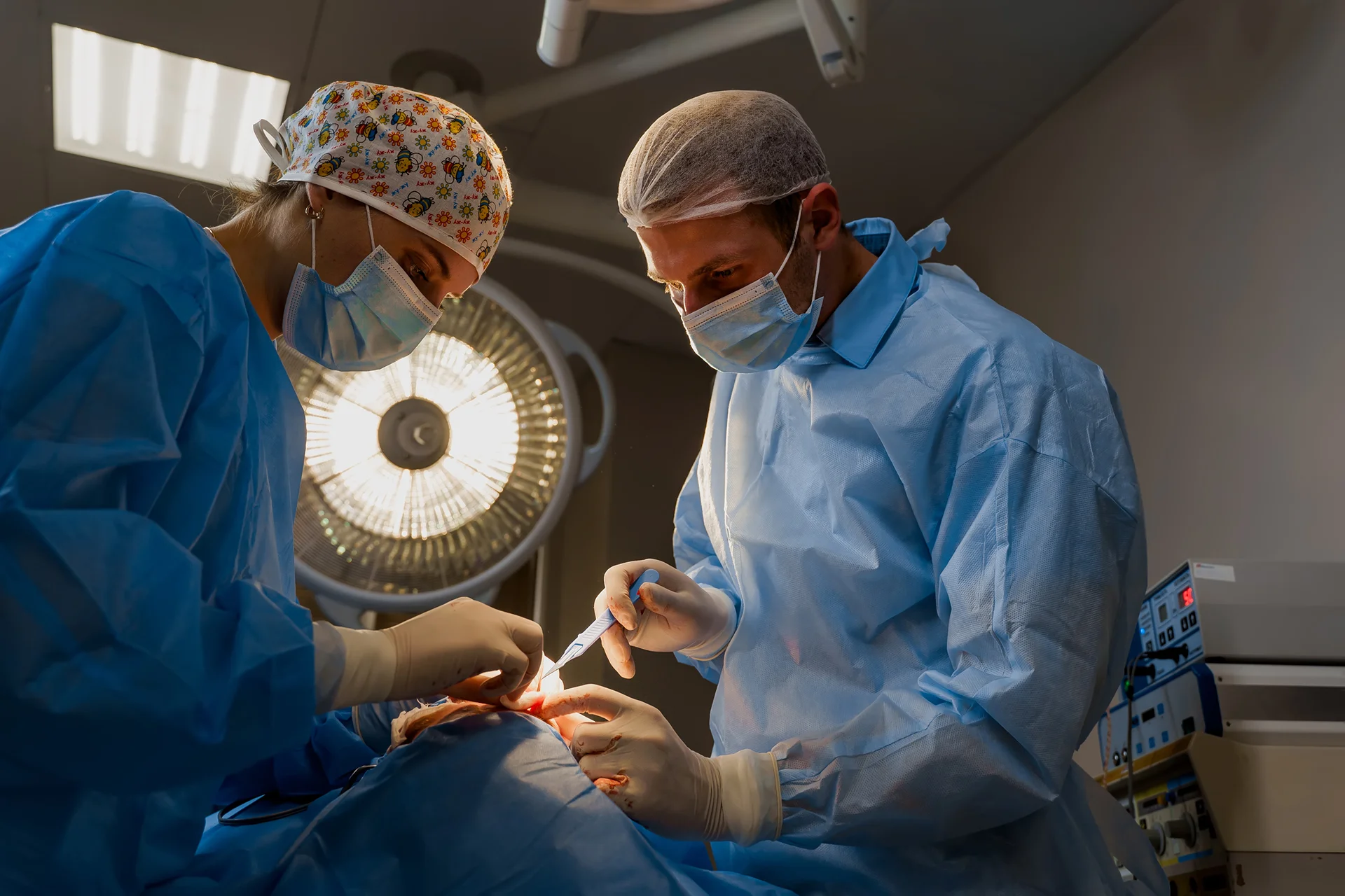 surgeons performing Mohs surgery on a patient