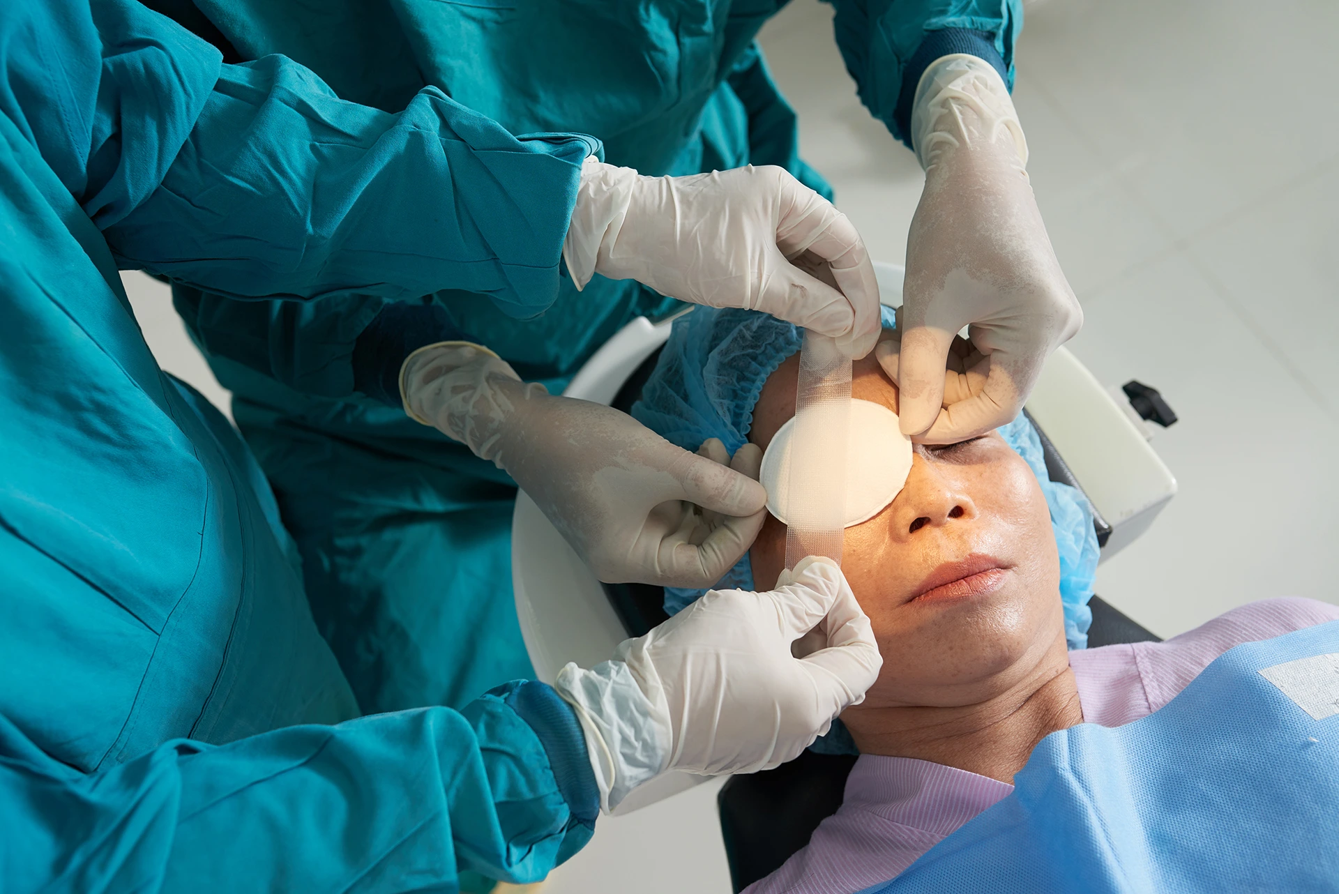 A woman is having surgery on her eye.