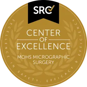 Gold badge with "SRC Center of Excellence Mohs Micrographic Surgery" written in the middle, enclosed by the words "Excellence in Safety, Efficacy & Efficiency.