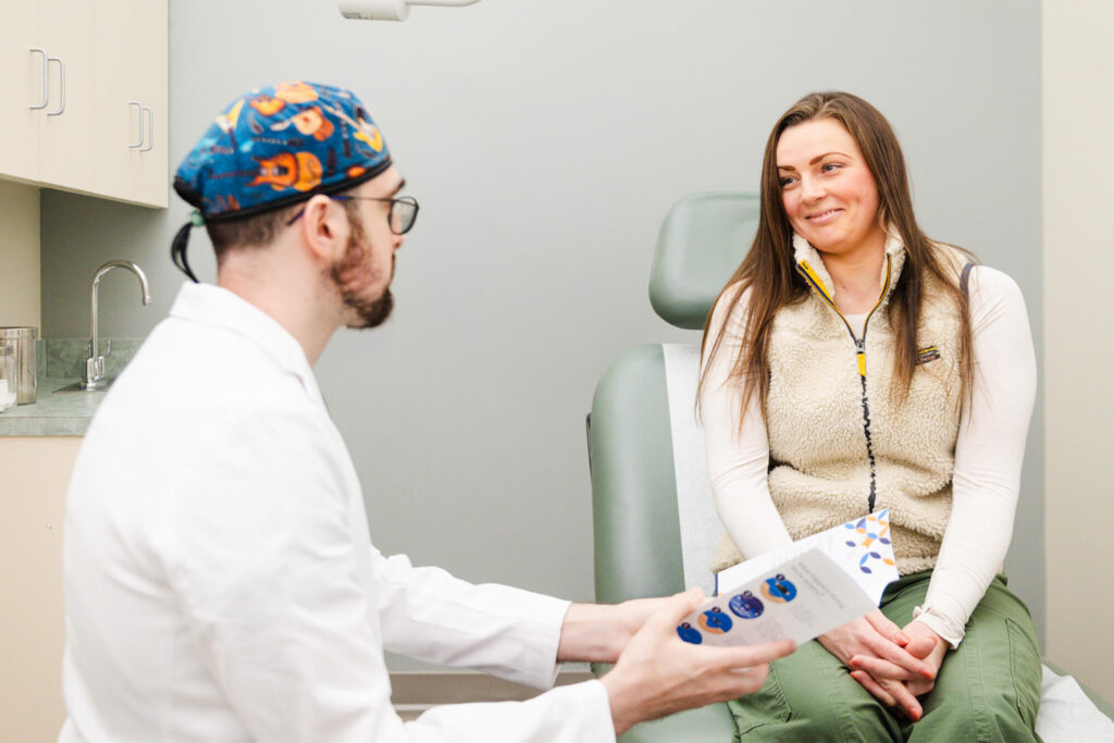 Doctor talking with patient