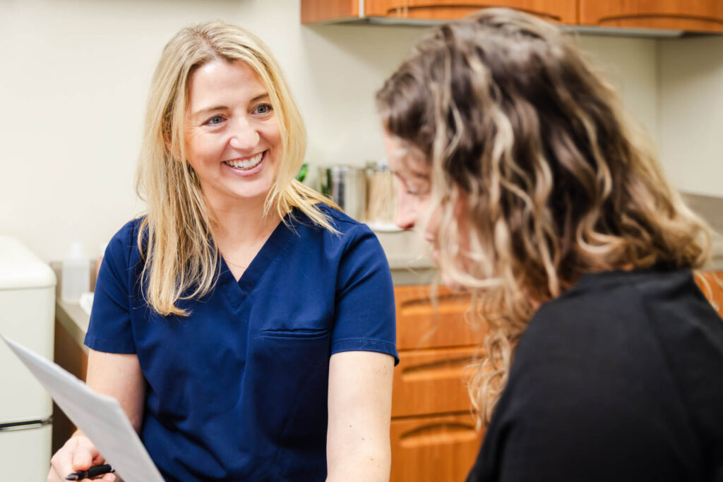 Clinical team member discussing options with patient