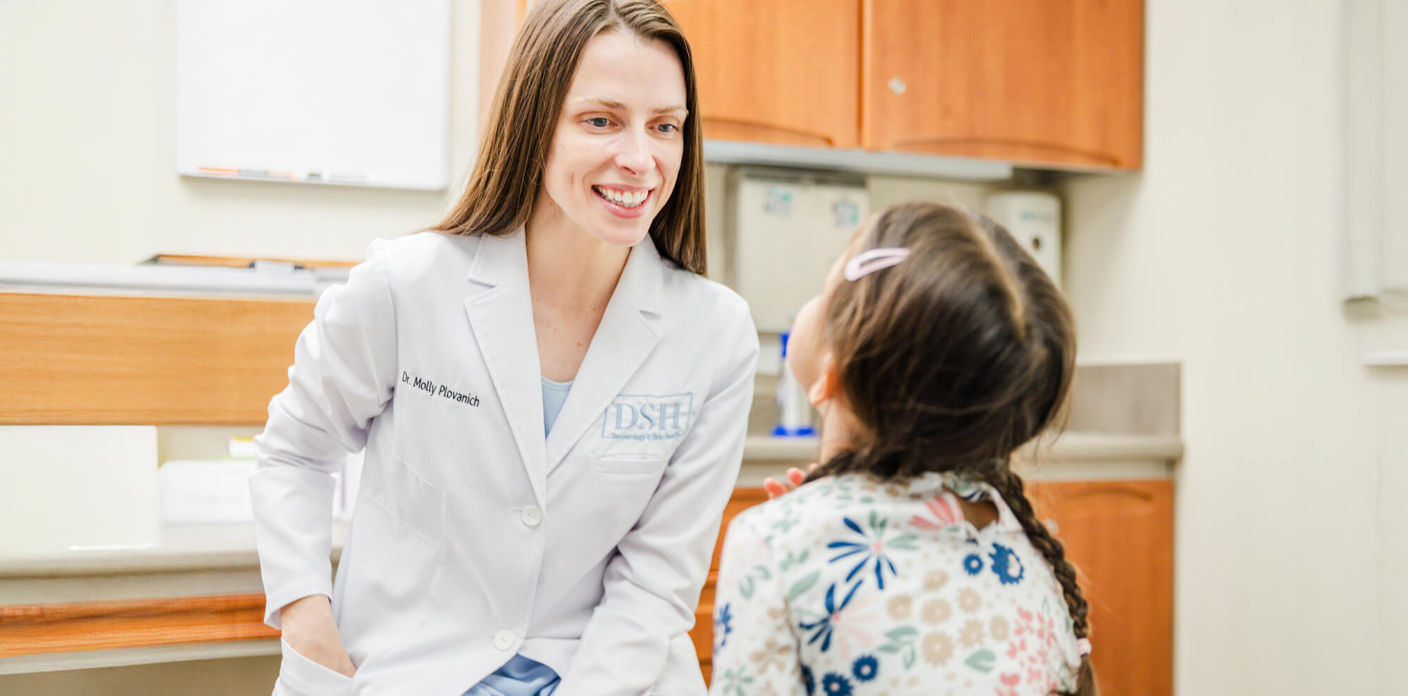 Dr molly plovanich with child patient