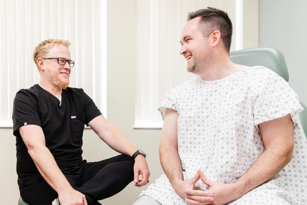 Patient sitting with doctor